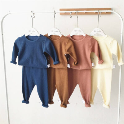 Soft ribbed baby and toddler pajamas in solid color