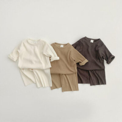 Soft ribbed baby and toddler pajamas in solid color