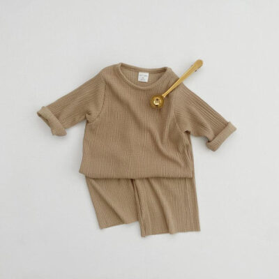 Soft ribbed baby and toddler pajamas in solid color