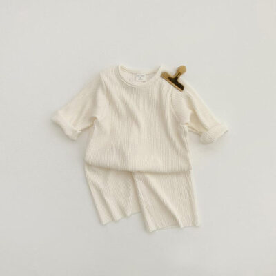 Soft ribbed baby and toddler pajamas in solid color