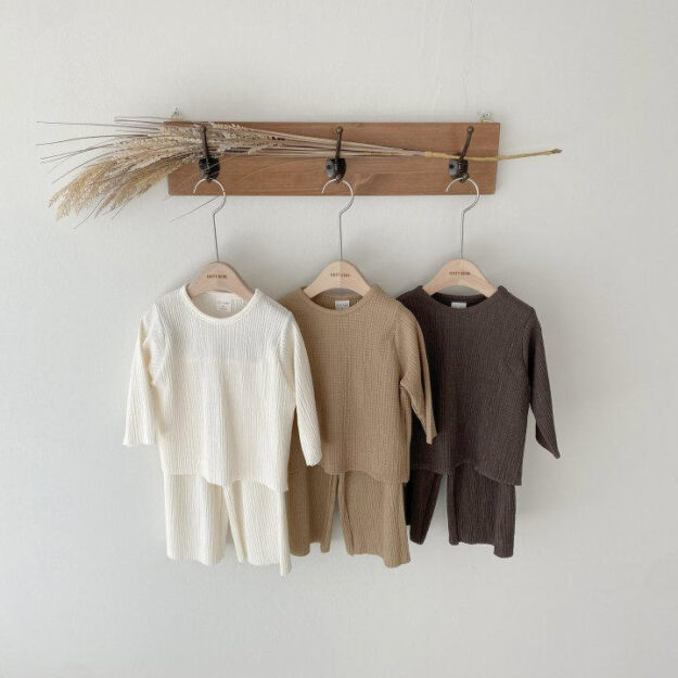 Soft ribbed baby and toddler pajamas in solid color