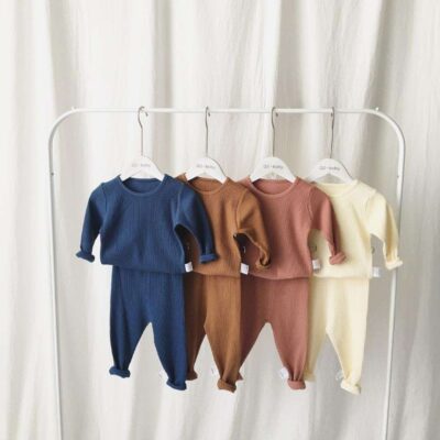Soft ribbed baby and toddler pajamas in solid color